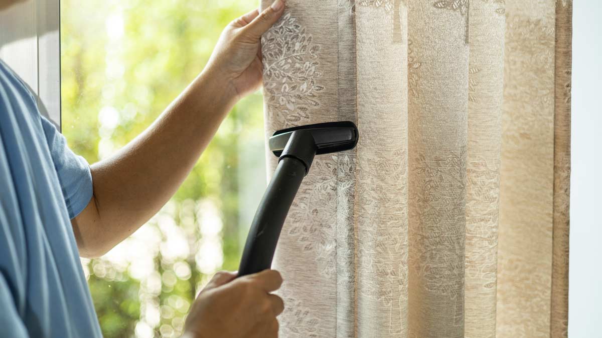 curtain-cleaning-company-nassau-county A professional curtain cleaning service in Nassau County, showcasing clean drapes enhancing indoor air quality and aesthetics.