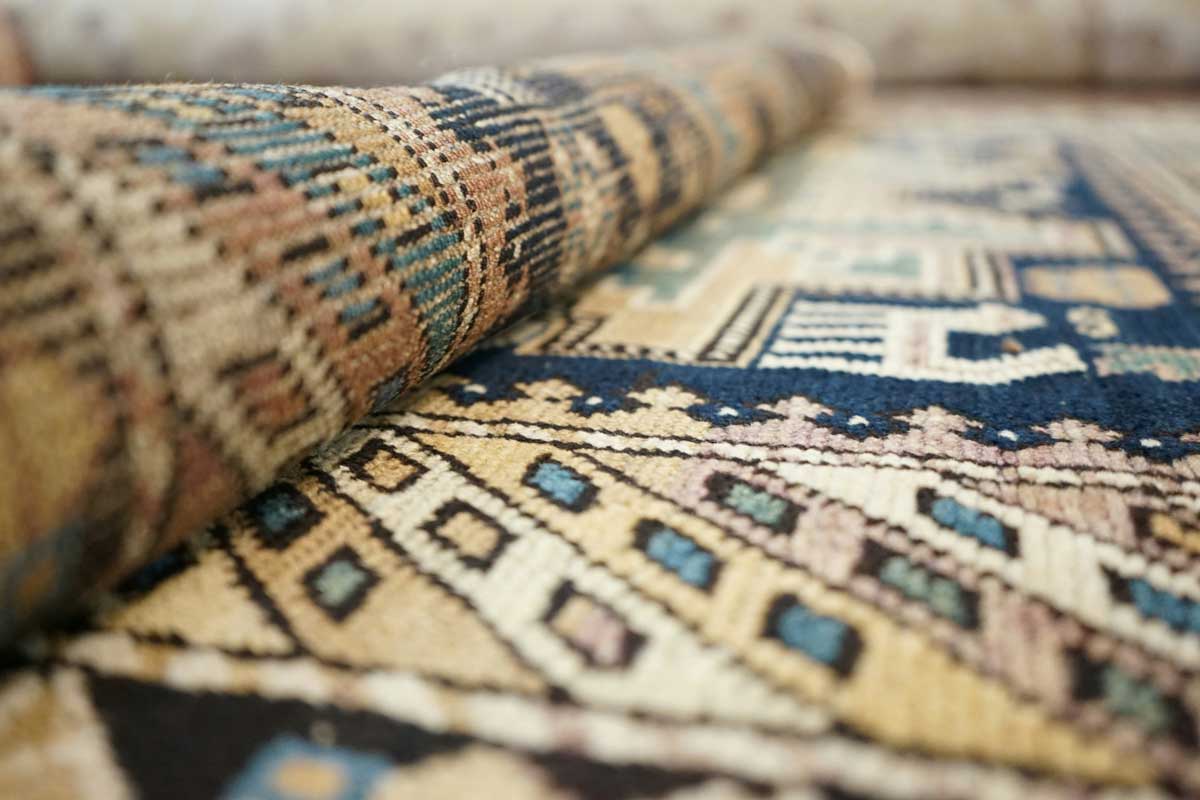 A certified rug appraisal document highlighting the importance of professional evaluation for valuable rugs.