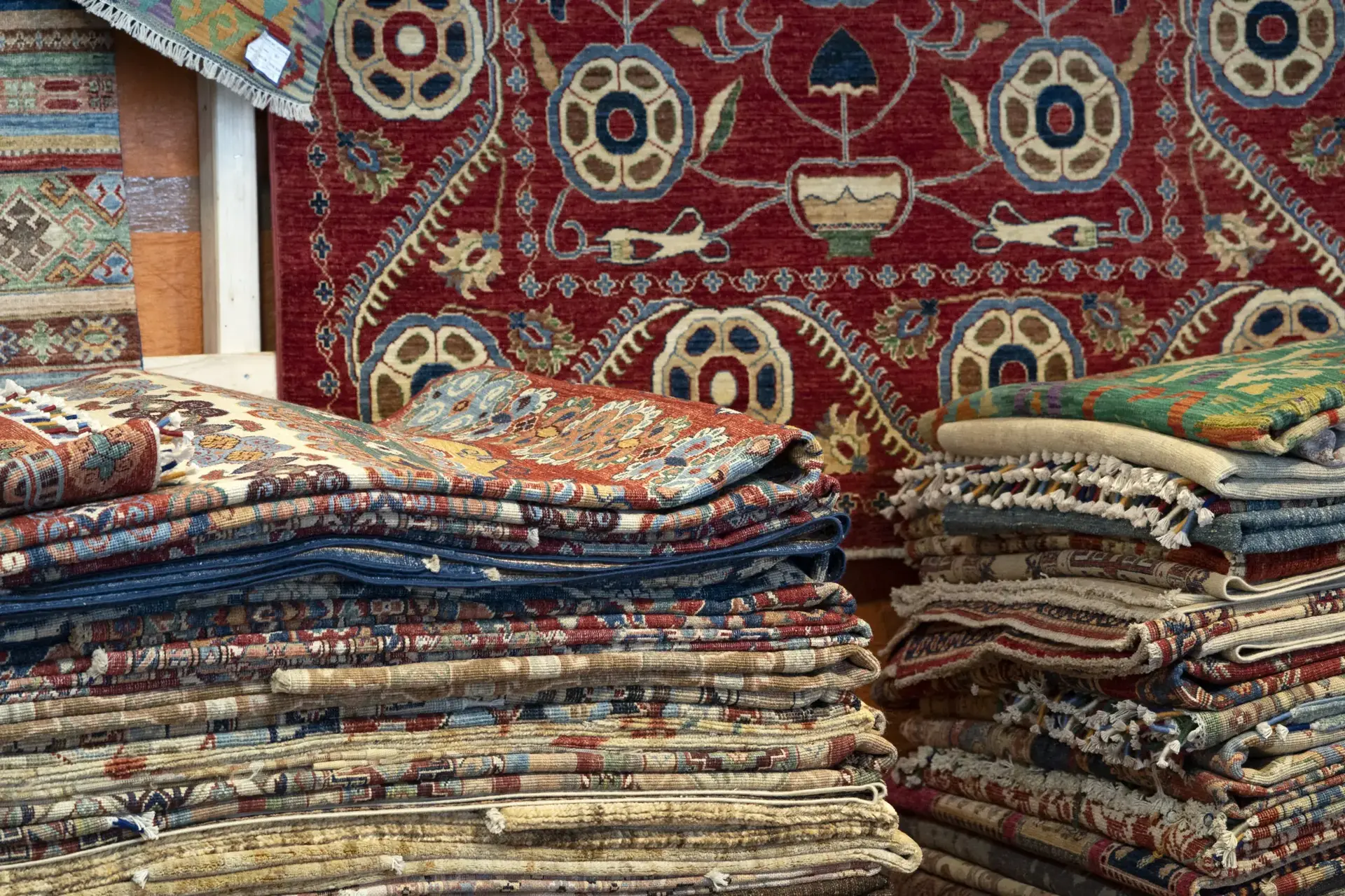 Close-up of a rug undergoing a professional restoration process to remove pilling, debris, and faded fibers, restoring its original texture and beauty.